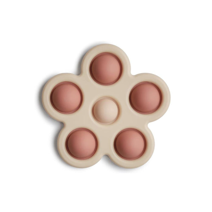 Mordedor em Silicone Mushie Flor Pop it Blush