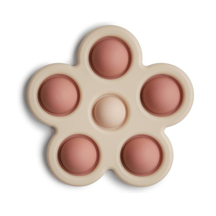 Mordedor em Silicone Mushie Flor Pop it Blush