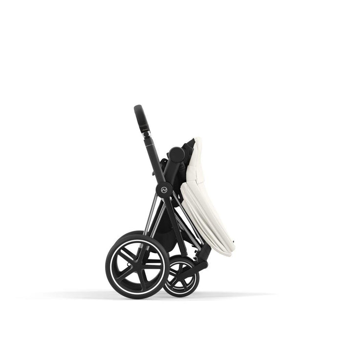 Pack Cybex Platinum Priam Chassis e Assento Chrome Black + Tecidos Off White + Cloud T Plus i-Size 45-87cm White + Base Isofix T