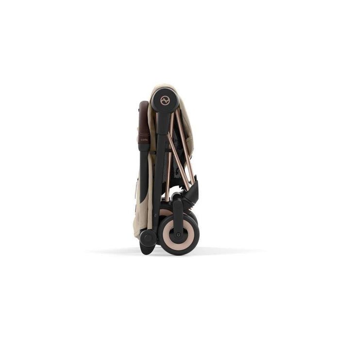 Pack Cybex Coya Rosegold Cozy Beige + Barra de Apoio de Braços Dark Brown