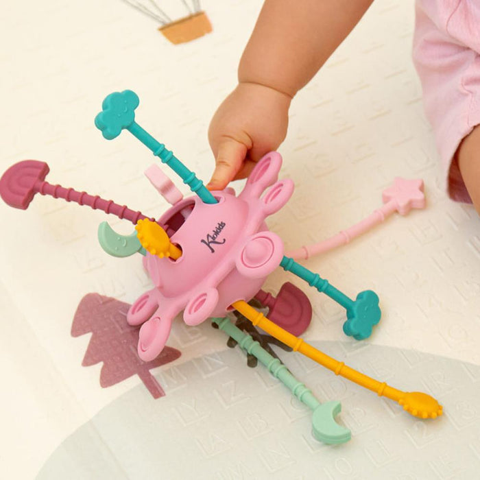 Mordedor Sensorial de Puxar em Silicone Kiokids Rosa
