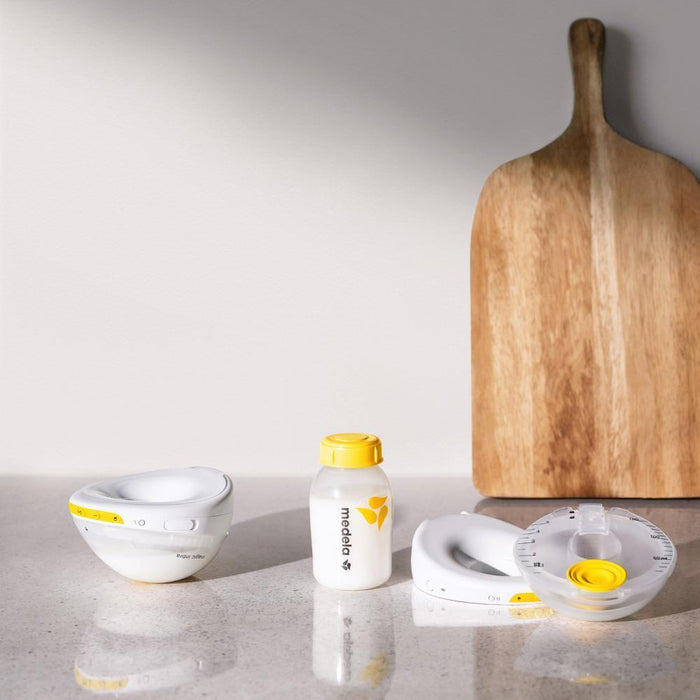 Bomba Tira-Leite Elétrica Mãos-Livres Medela Magic InBra Dupla